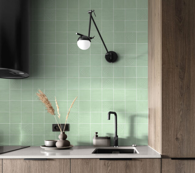 Close-up,On,Beige,Kitchen,Countertop,With,Decorations,,Stylish,Tap,And